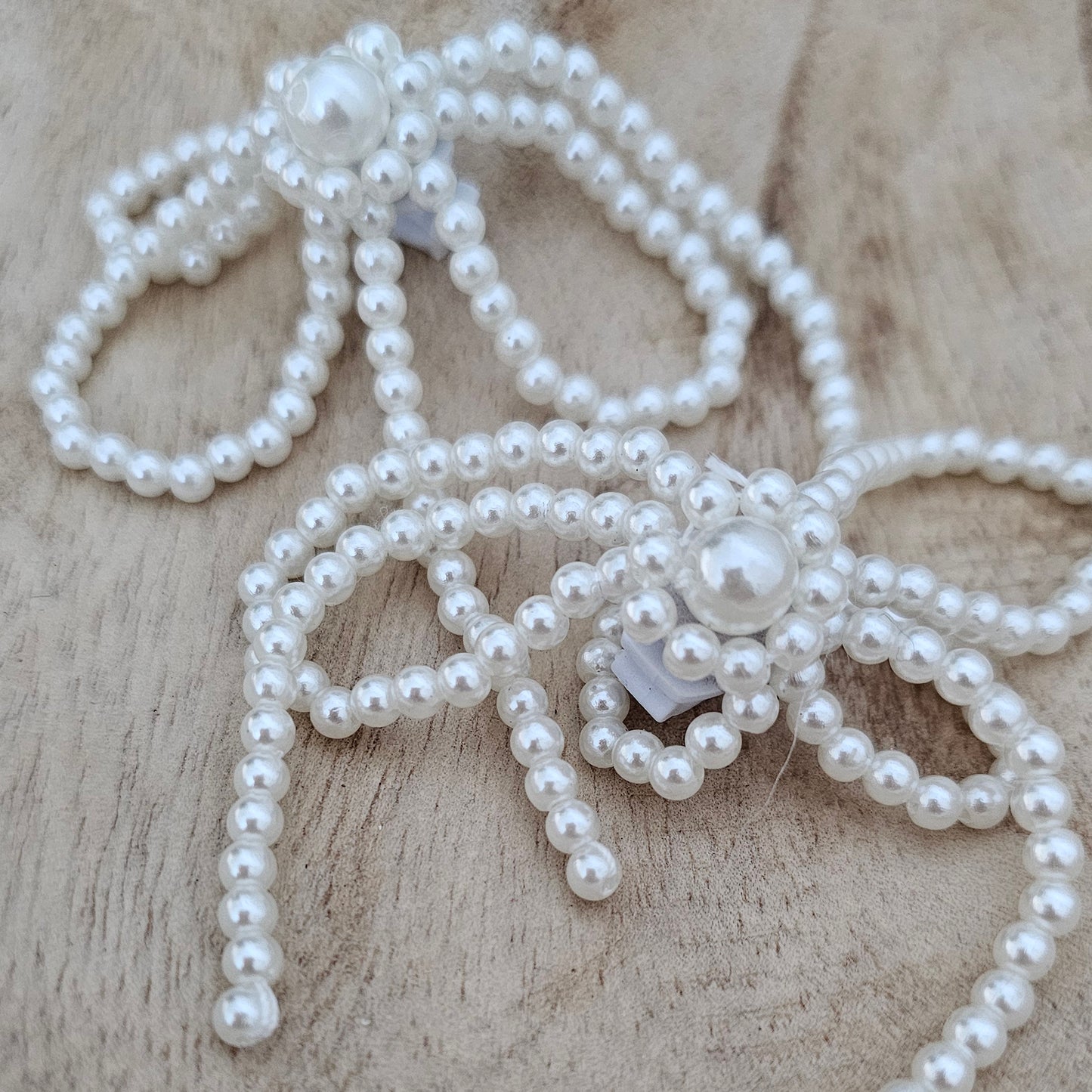 Pearl Bow Shoe Charms Close-Up